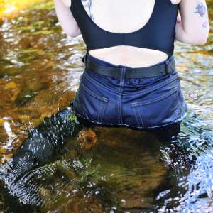 DungeonMasterOne: Alternative girl Kitty in the river in jeans, boots, and swimsuit!