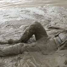 DungeonMasterOne: Chastity wears designer Armani jeans into the mudbanks!