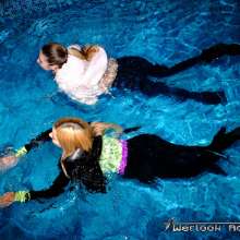 Tarzan: WetlookAdventure--2 wet girls In the pool